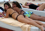 Girls Relaxing on Beach Bed in Cozumel