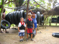 Belize Cave Tubing start of excursion, kids being outfitted with their cave tubing equipment