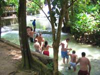 Walking up Dunns River falls in Jamaica