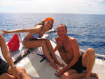 Happy couple on catamaran